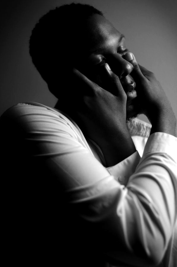 Black and white three-quarter portrait of Gabriel Walker.