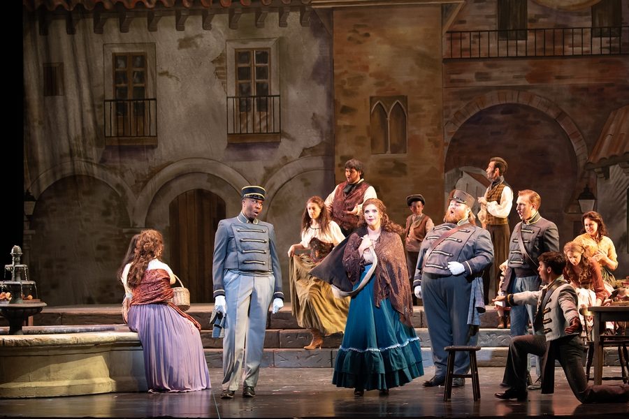 Wide stage view of the Carmen town square scene at Utah Festival Opera.
